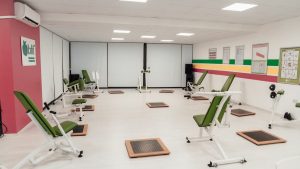 Bright and spacious gym interior featuring modern green exercise machines in Yalova.